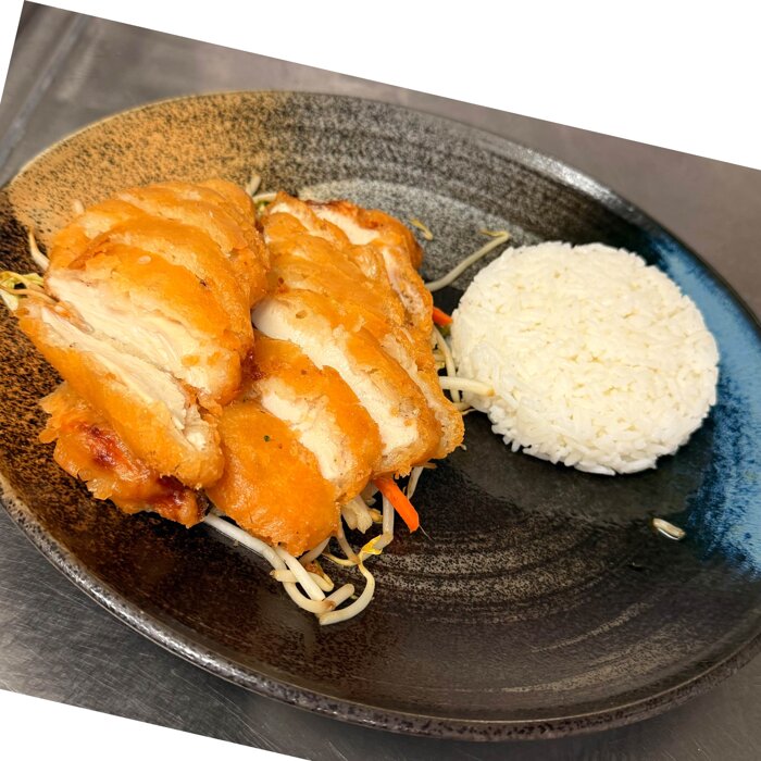 Knuspriges Hühnerbrustfilet paniert mit 
